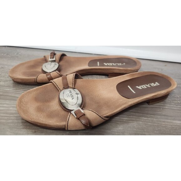 Prada Women's Sz. 37.5/7.5 Brown Tan Leather Silver Logo Slip On Sandals - Picture 1 of 9